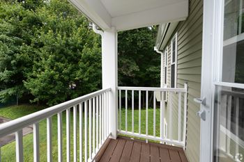 White porch with railings